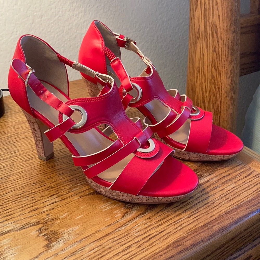 Red shoes with gold accents